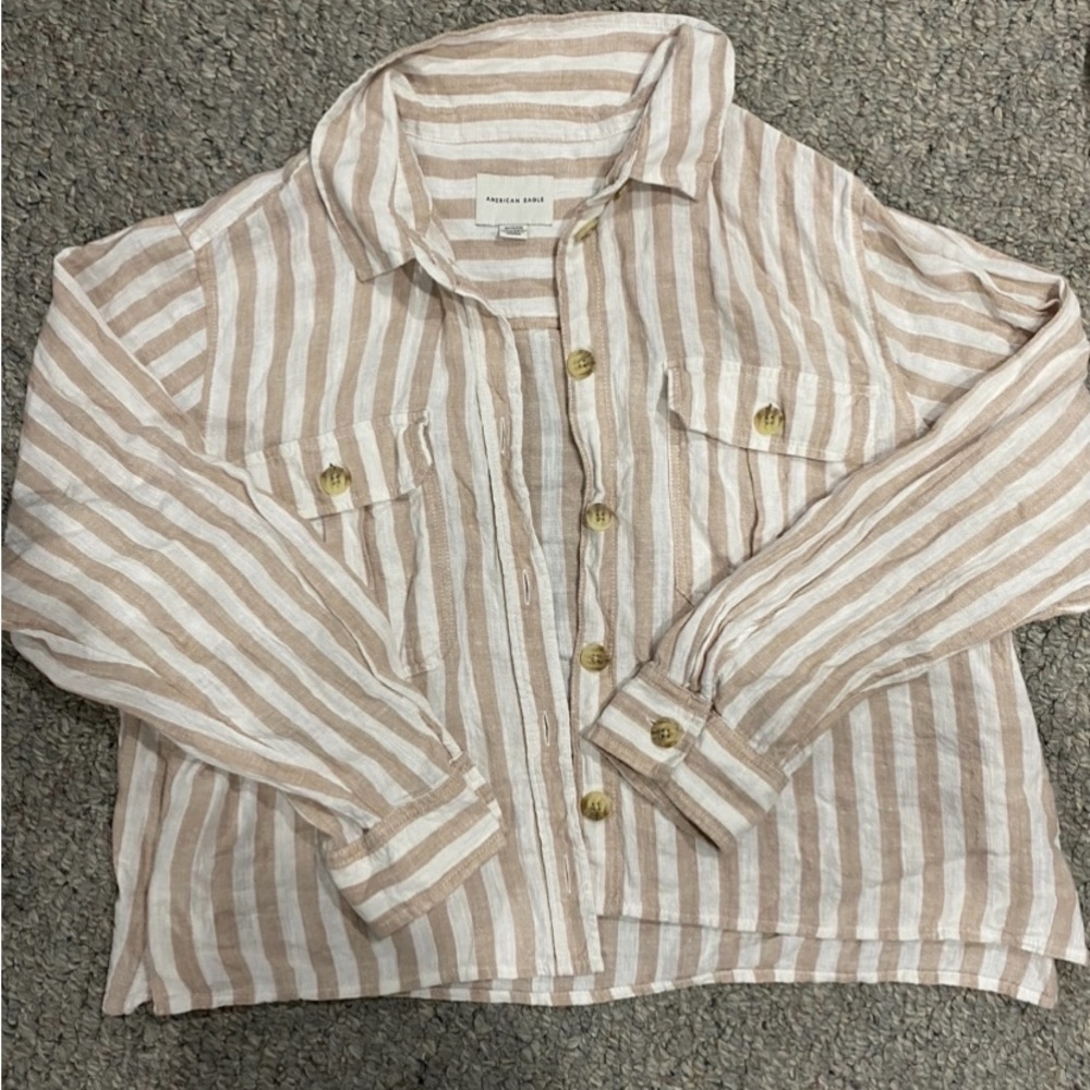 Women’s tan and white shirt